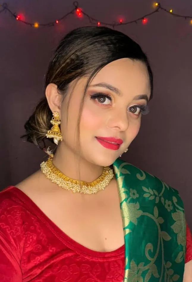 Engagement glam with a red and green saree