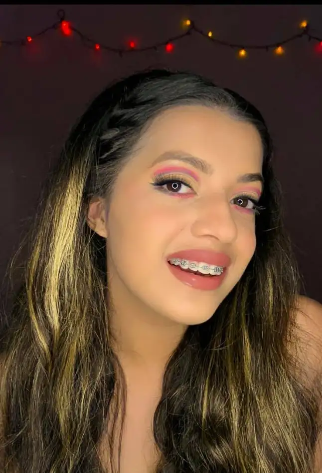 Radiant client with everyday glam makeup and loose waves